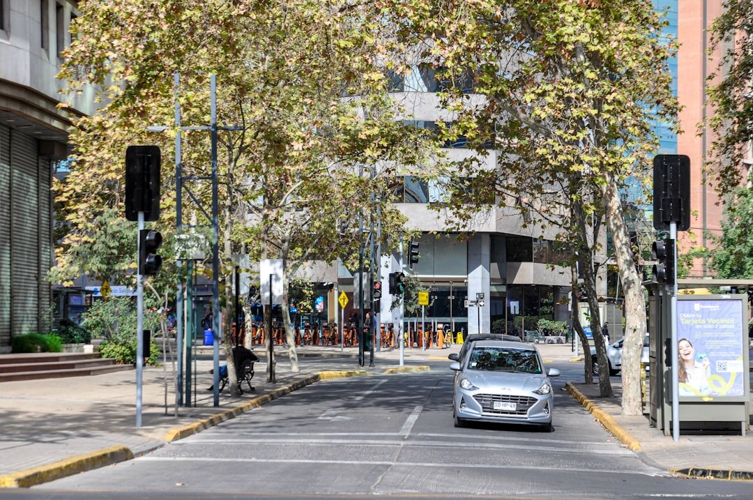 Busy urban street in Santiago Chile with pedestrians and traffic